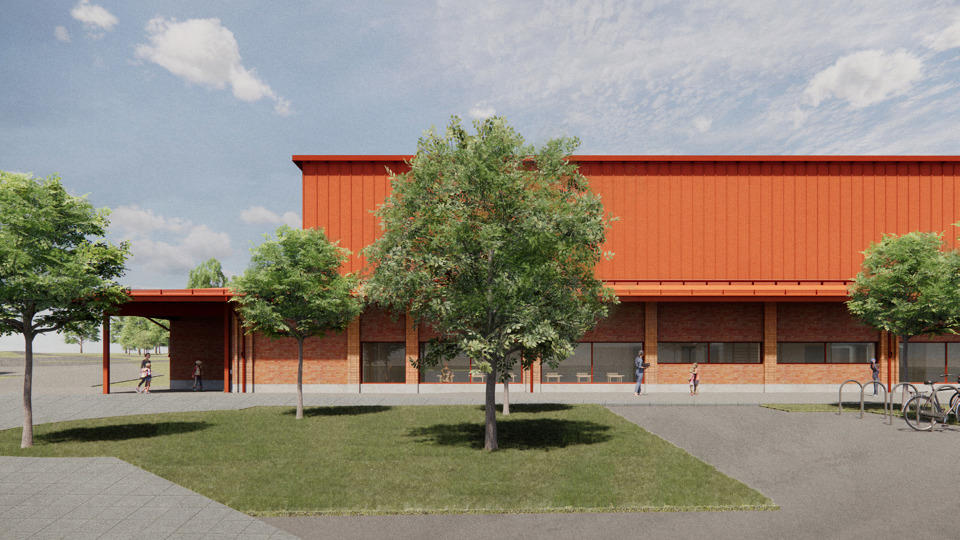 Illustration över en ny röd skola som ska byggas.